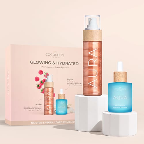 HYDRATED & GLOWING: Offre une hydratation ultime avec AQUA aux 8 poids moléculaires d'acide hyaluronique. Brille de la tête aux pieds avec AURA qui contient des particules de mica et des peptides hydratants.