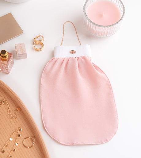 EXFOLIATING MITT: Μεταξωτό γάντι απολέπισης. Κατάλληλο και για προετοιμασία και αφαίρεση του αυτομαυριστικού προϊόντος.