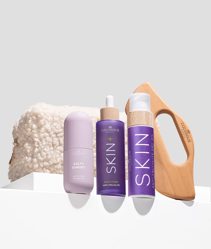 ANTI-CELLULITE THERAPY & SALTY SUNSET + GIFT: Alisa la piel de los glúteos y los muslos y envuélvela en un aroma dulce-salado. El sérum SKIN+ reduce visiblemente la celulitis con 4 ingredientes activos en máxima concentración. El aceite seco anticelulítico SKIN, aplicado con el masajeador BODY GUA SHA, potencia el efecto anticelulítico y moldea tus curvas. SALTY SUNSET es una bruma para el cuerpo y el cabello con el aroma dulce-salado a pistacho, caramelo y sal. Cloud Pouch es un regalo nuestro: un tesoro esponjoso para añadir a tu colección de bolsitas.