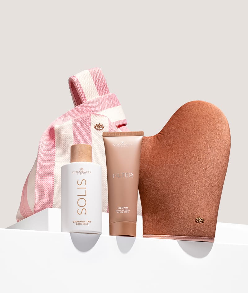 CARAMEL SKIN + GIFT: Com este trio, tens uma pele perfeita sem complicações na aplicação. O leite corporal SOLIS Milk proporciona hidratação diária e um bronzeado que se adapta ao tom da pele e se intensifica a cada aplicação. O creme corporal FILTER num tom médio uniformiza instantaneamente o tom da pele, suaviza pequenas imperfeições e confere um brilho subtil e um bronzeado dourado. A luva SELF-TANNING MITT é uma luva aveludada que garante uma aplicação impecável de ambos os produtos. A Gelato Bag é o nosso presente para ti: agarra-a antes que derreta.